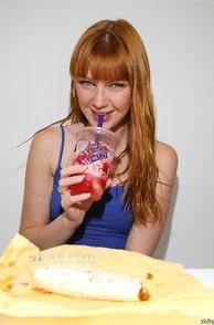 Pretty Eyes Redhead Girl Enjoying Lunch